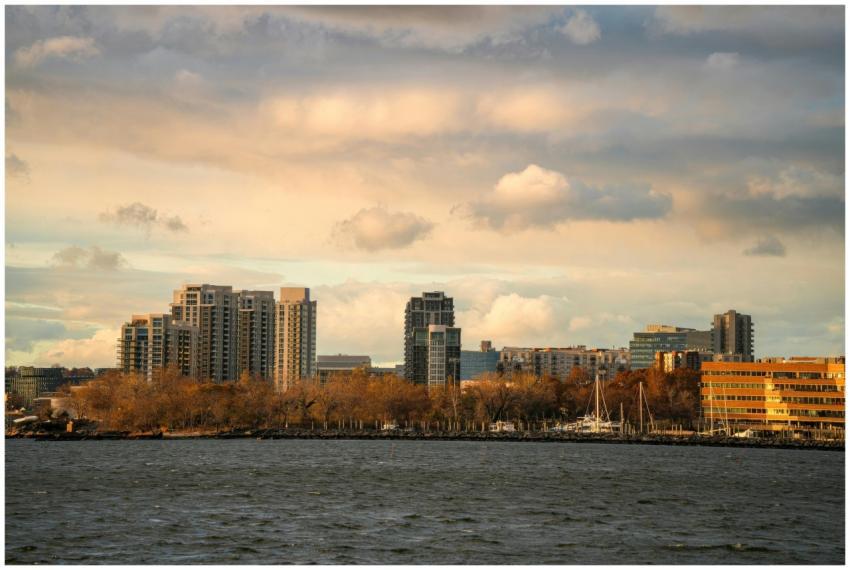 City skyline with waterfront view and boats during