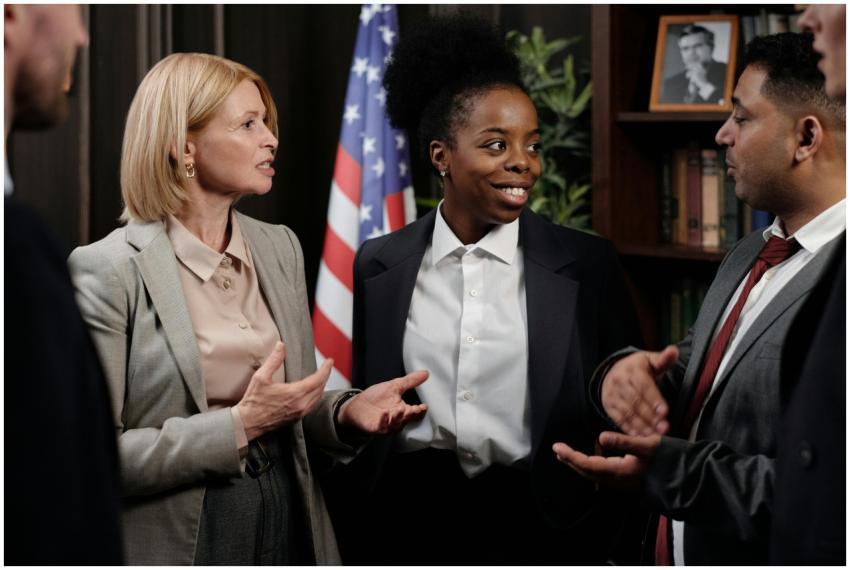 Colleagues in a professional meeting discussing st