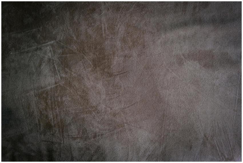 A detailed close-up of brown suede fabric showcasi