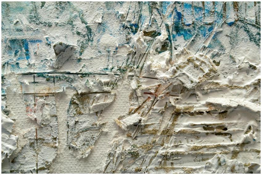 Close-up of textured abstract painting with layere