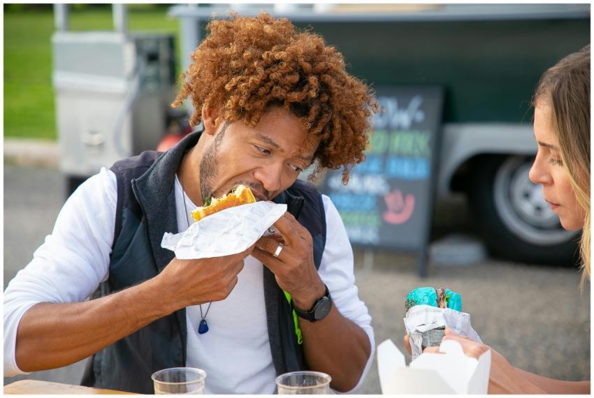 Hungry young African American male with curly hair