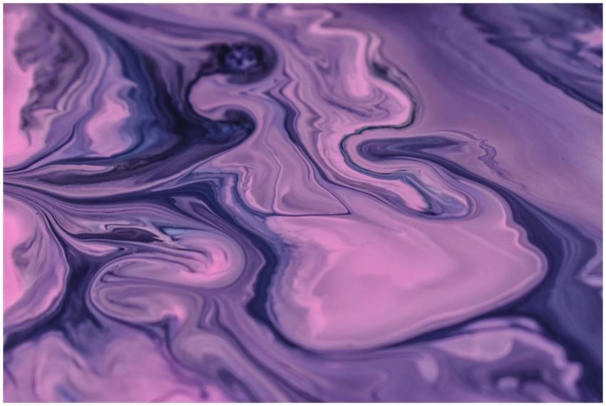 Close-up of vibrant purple and pink abstract paint