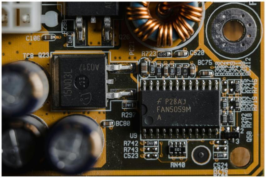 Detailed view of microchips and components on a mo