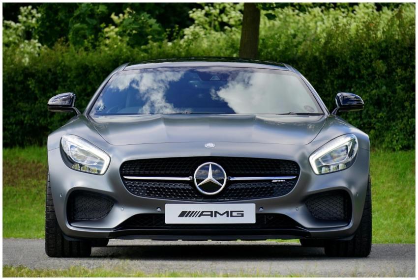 Front view of a luxury Mercedes-Benz AMG against a