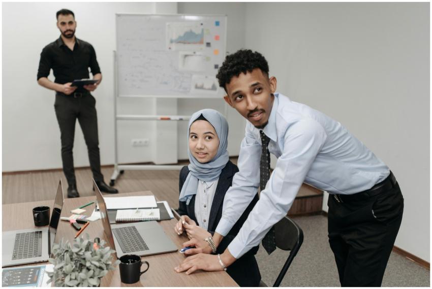 Team discussing business strategies in an office w