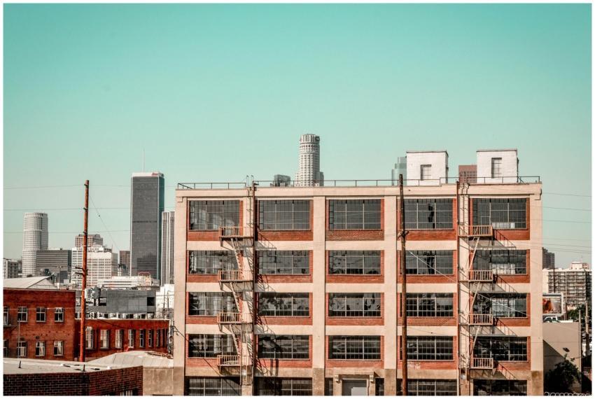 Industrial building facade with Los Angeles skylin