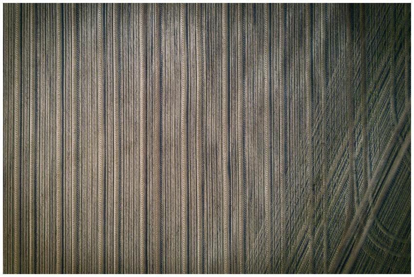 A stunning aerial view of a cornfield with intrica