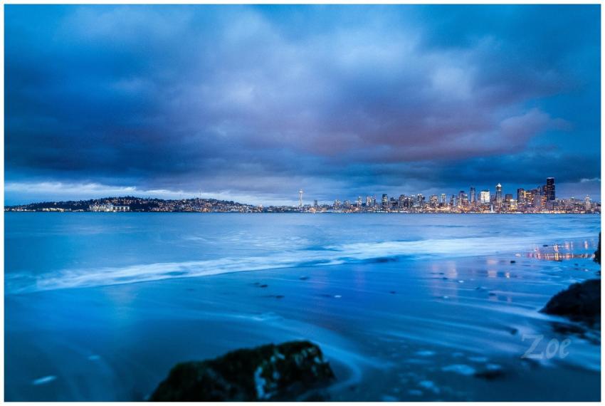 Dramatic Seattle cityscape with illuminated skylin