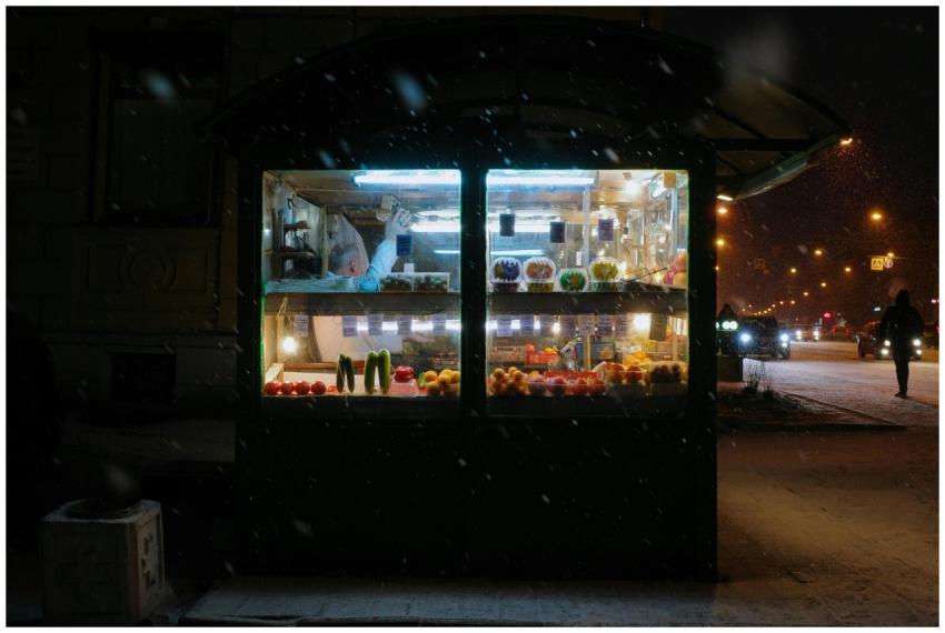 A cozy street kiosk in Saint Petersburg illuminate