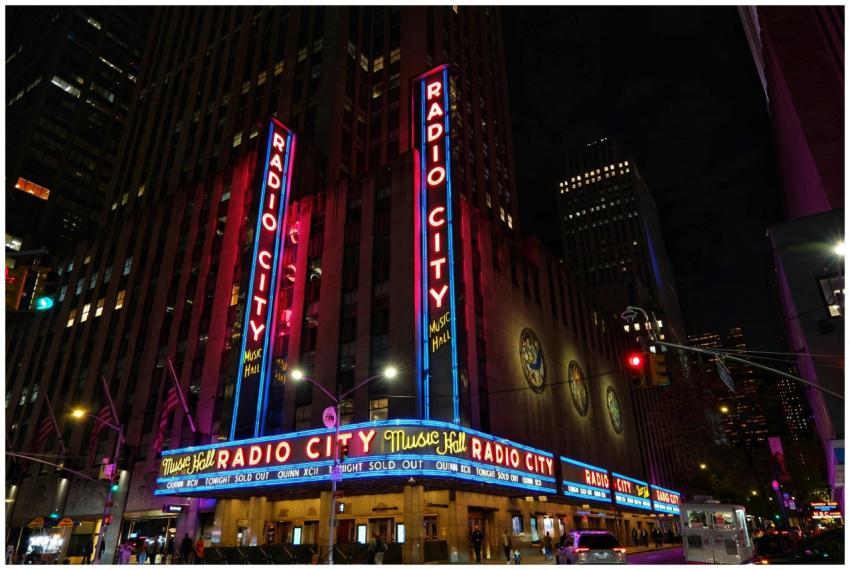Vibrant neon lights of Radio City Music Hall illum