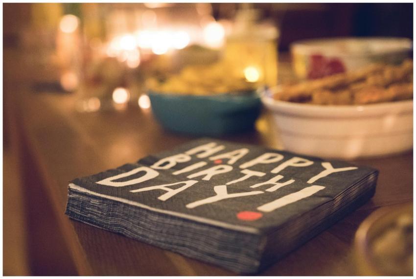 Close-up of a festive birthday table setup with sn