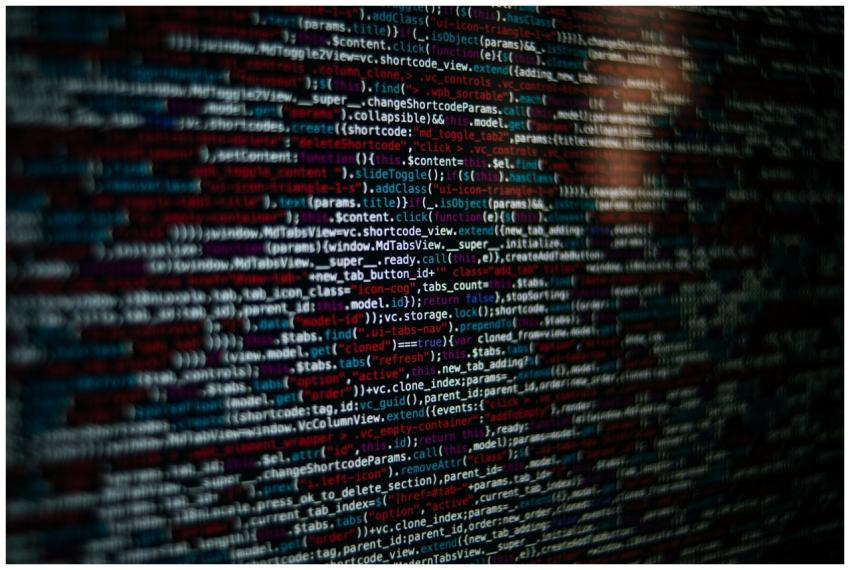 Detailed image of computer source code displayed o