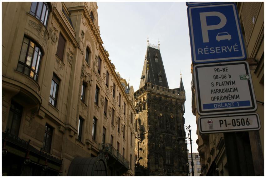 A charming Prague street scene featuring a histori