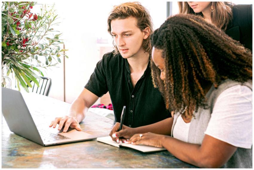Young professionals collaborating on a project in
