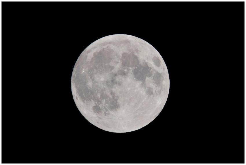 Stunning full moon against a dark night sky, showc
