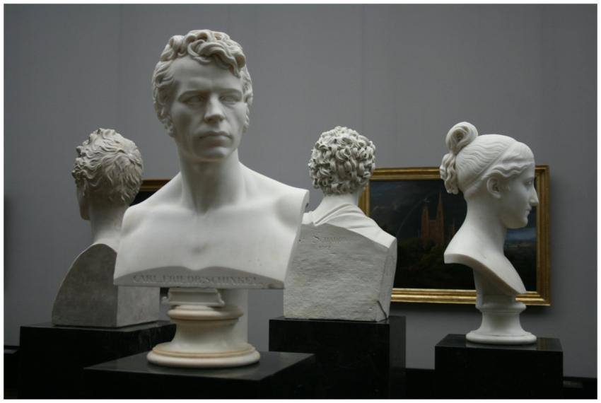 Collection of classical marble busts displayed in