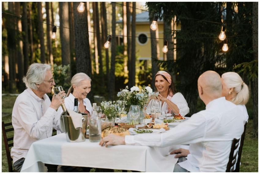 Senior group enjoying a delightful outdoor dinner