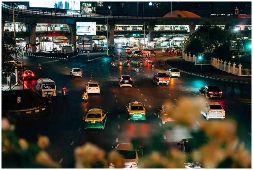 Dynamic night view of traffic on a bustling Bangko