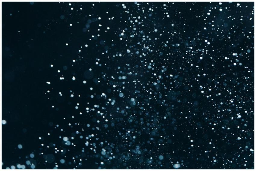 Captivating close-up of water droplets and particl