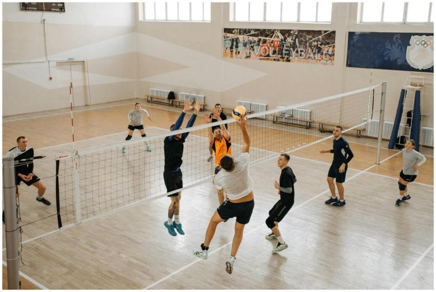 Exciting indoor volleyball game featuring diverse