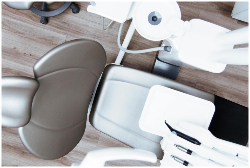 High-angle view of a modern dental chair and equip