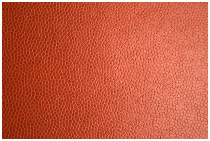 Detailed macro photo of orange leather texture, pe