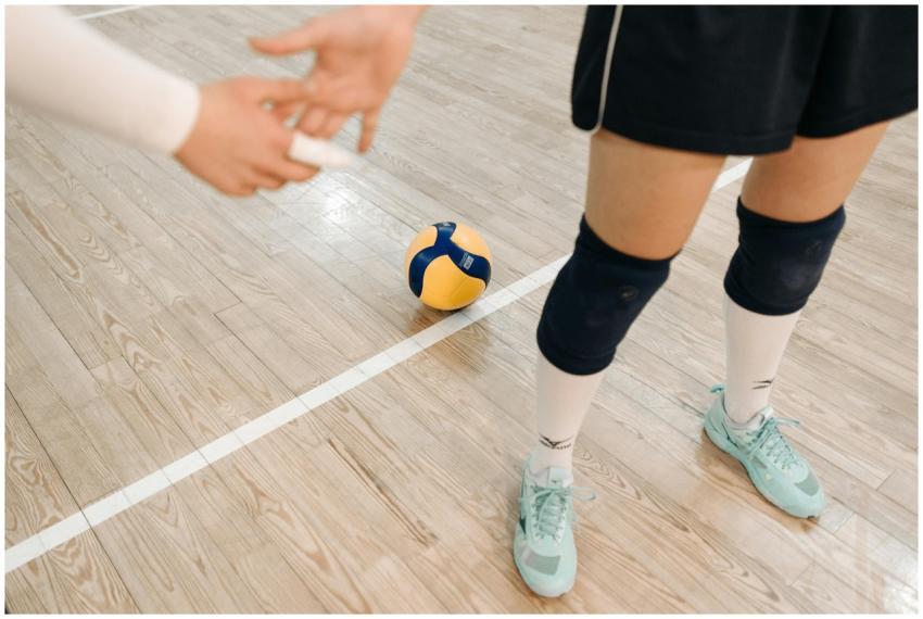 Close-up of volleyball players ready for action on
