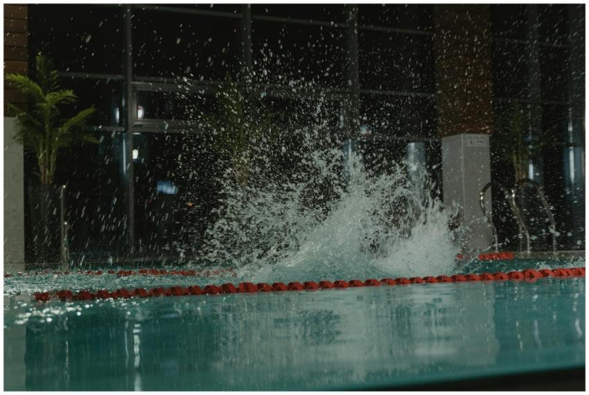 Capture of a splash in an indoor swimming pool wit