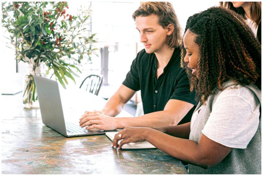 Young professionals collaborating on a project in