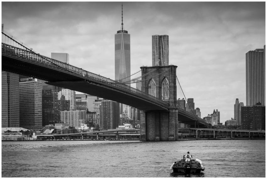 Black and white image of Brooklyn Bridge with Manh