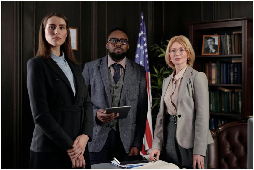 A diverse group of professionals in a formal offic