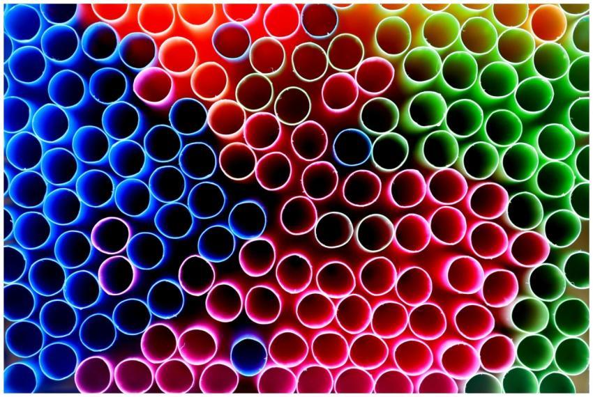 Close-up view of colorful straws forming an abstra