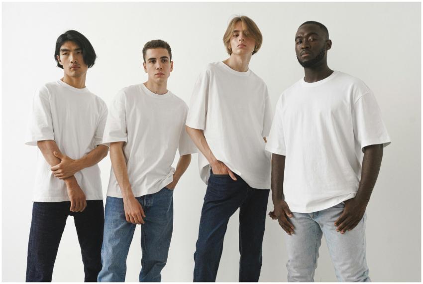 A group of four diverse men modeling white t-shirt