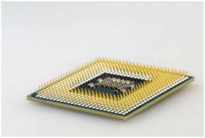 A detailed close-up of a CPU microchip showcasing