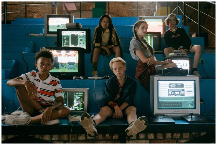 Teenagers enjoying retro video games in a nostalgi