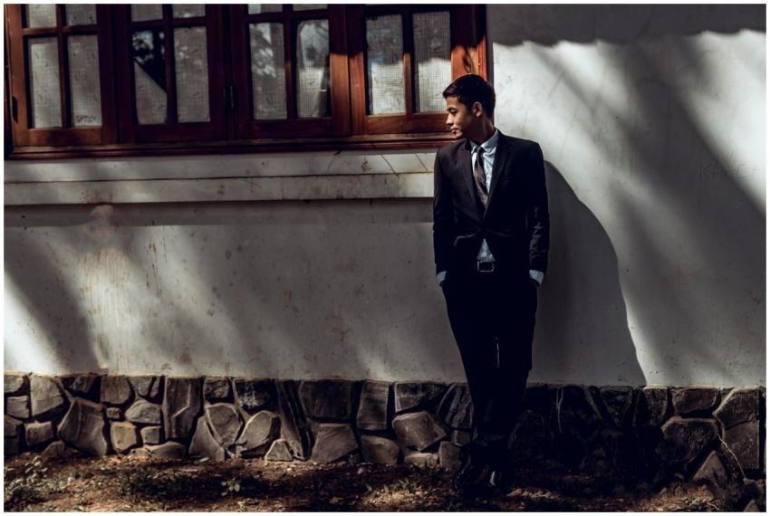 Man Suit Standing Window