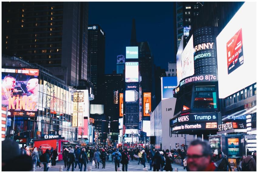 Bustling night scene in Times Square, New York Cit