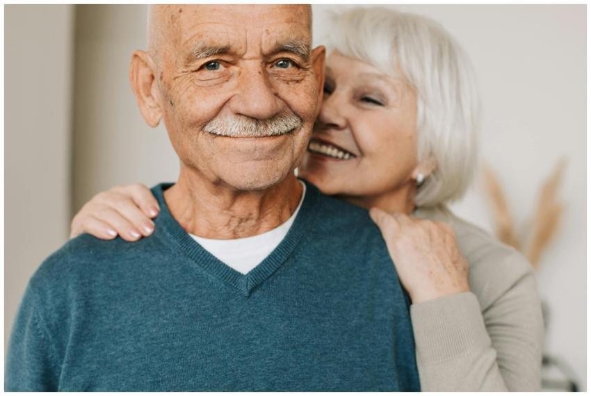 Joyful senior couple in an affectionate embrace, c