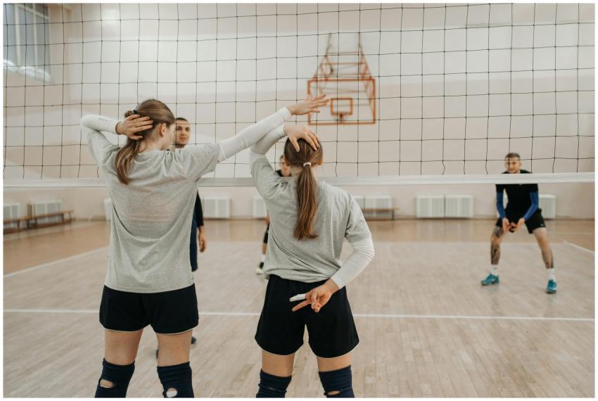 Volleyball players planning strategy during an ind