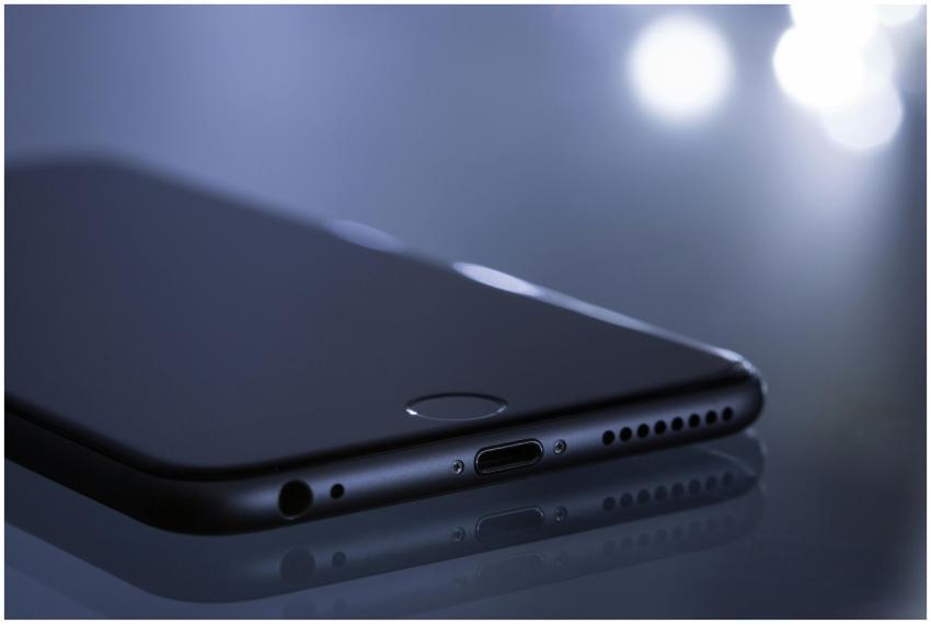 Close-up of a sleek smartphone with a blurred boke