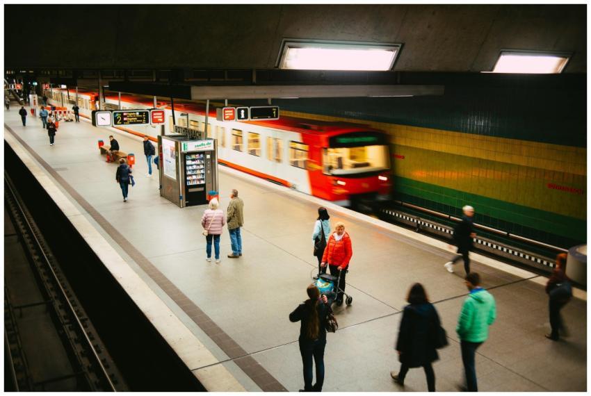 Vibrant subway station scene with people and a fas