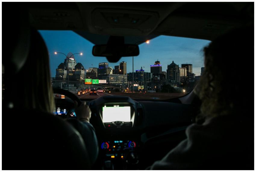 View of city skyline during night drive, captured