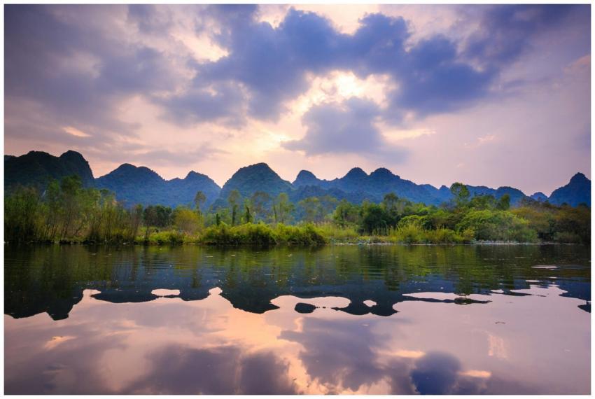 Serene view of a mountain landscape with reflectio