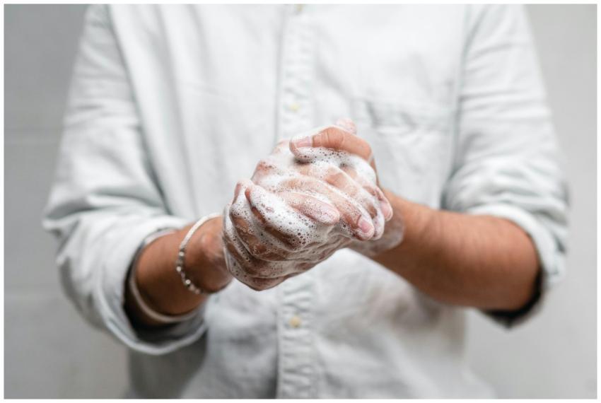 Close-up of hands lathered with soap for thorough