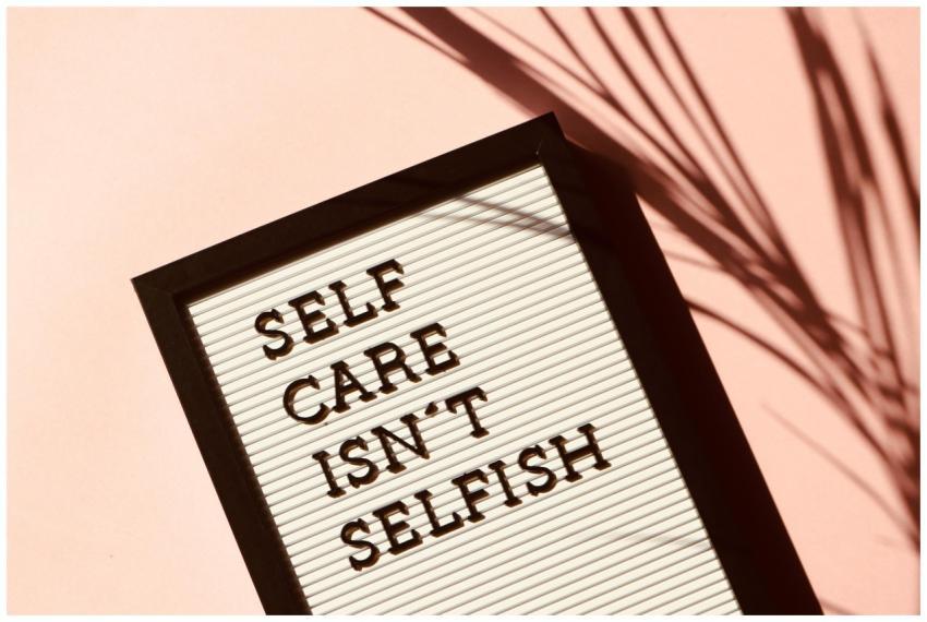 Letter board displaying 'Self Care Isn't Selfish'