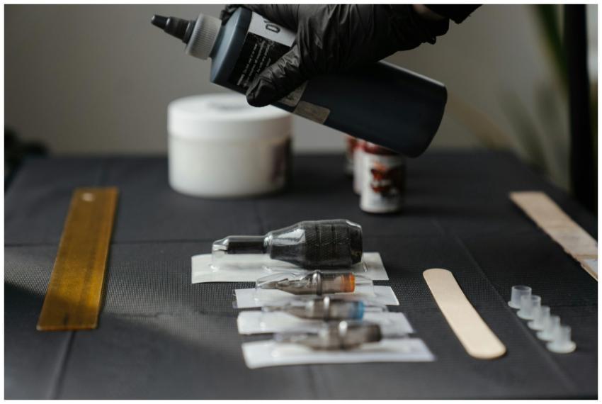 Close-up of tattoo equipment and ink in a tattoo s