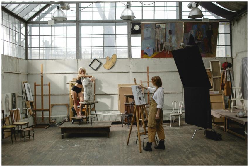 Art studio scene featuring an artist drawing a liv
