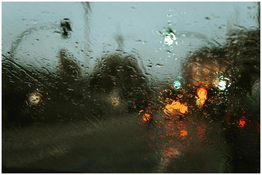 Road in modern city street with lights through car