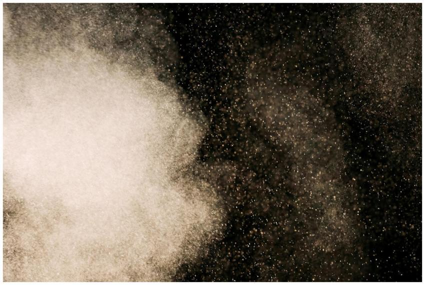 Abstract image of dust particles floating against