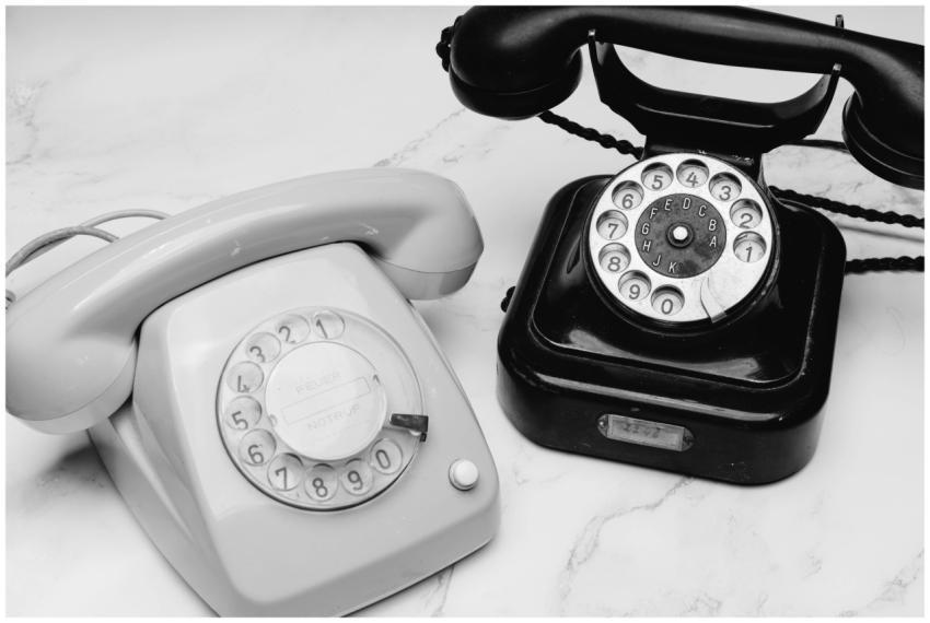 Black and white image of two vintage rotary dial t